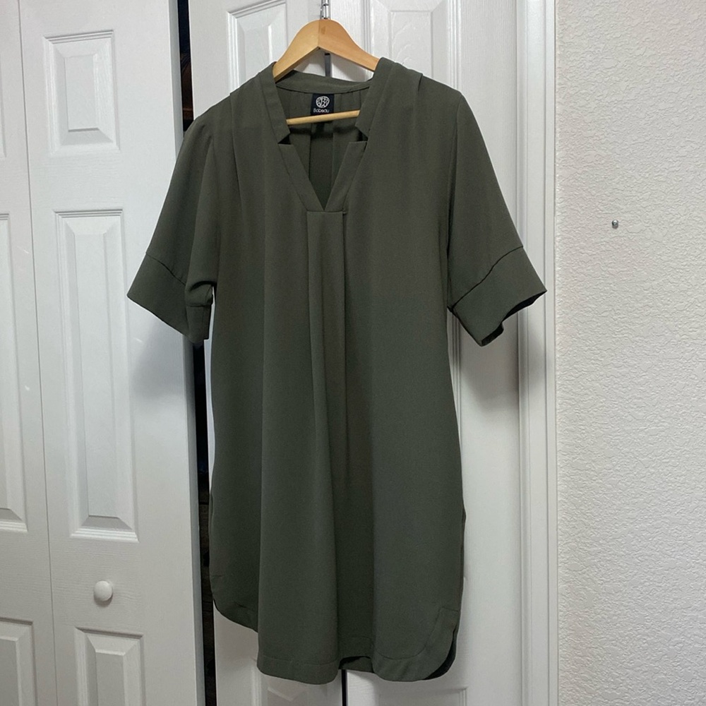 Great for fall olive dress with pockets add some boots and you’re ready to go